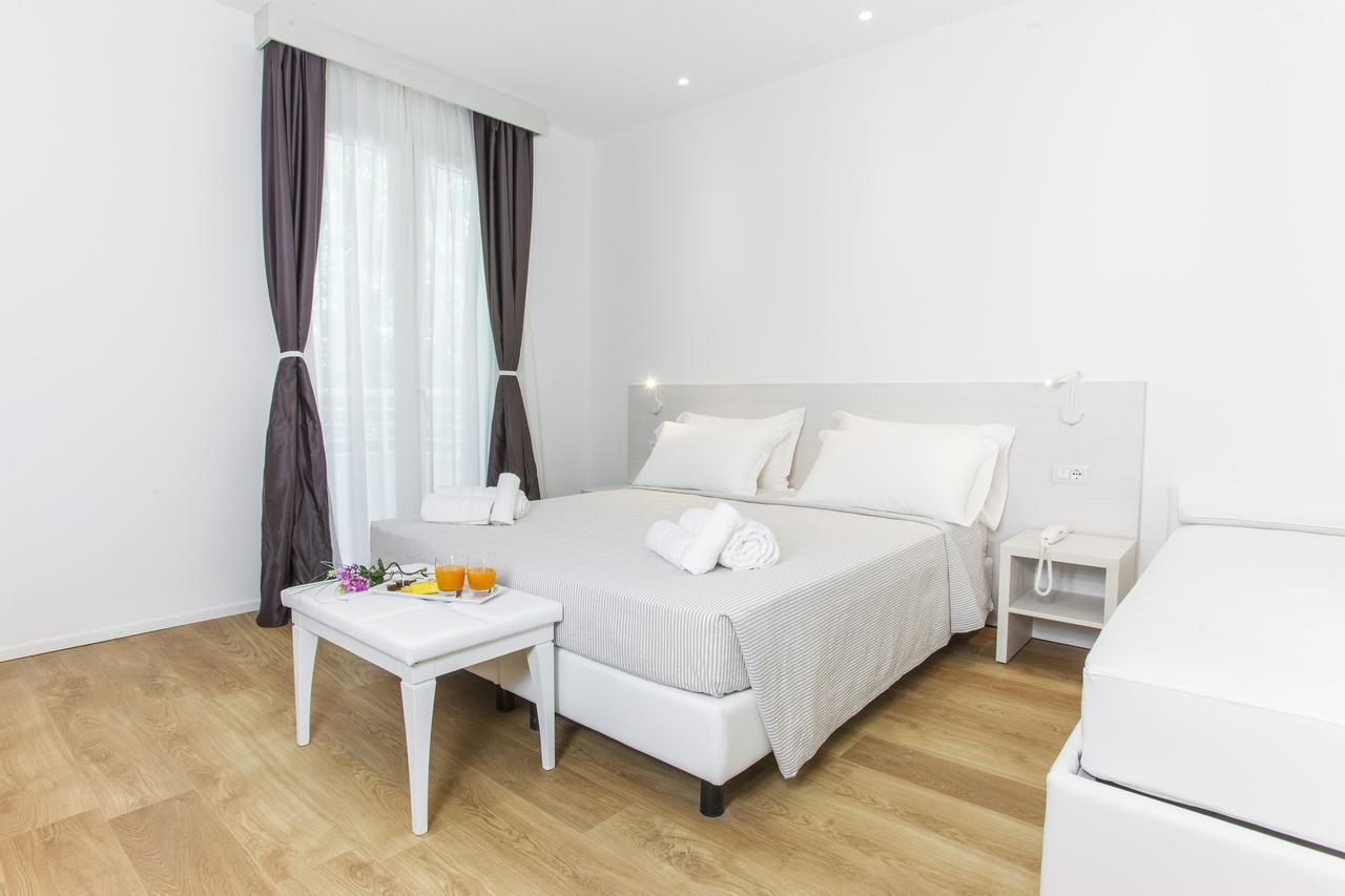 Hotel Houston Suites Римини Экстерьер фото